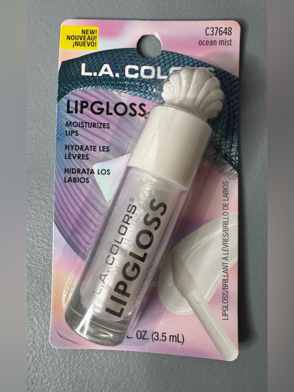 L.A. COLORS seashell Lipgloss in Ocean Mist Shimmer White Pearlescent shine beac